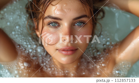 portrait, young pretty girl in spa salon, facial treatment with water portrait, young pretty girl in spa salon, facial treatment with water 112857133