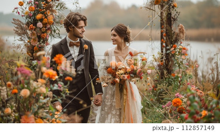 wedding, portrait of bride and groom, outdoors 112857149