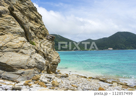 Big rock at Aharen Beach on Tokashiki Island in Okinawa, Japan. 112857499