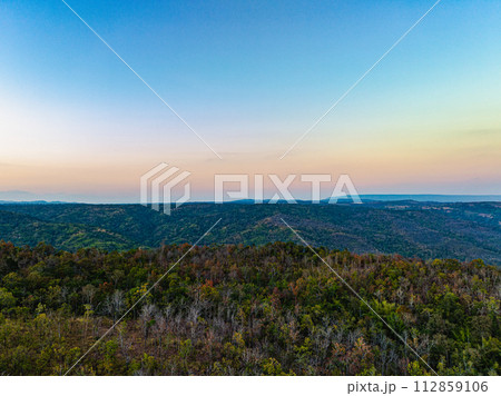 Mountainous Autumn Landscape with Vibrant Foliage and Scenic Views Mountainous Autumn Landscape with Vibrant Foliage and Scenic Views 112859106