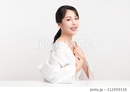 Beautiful young asian woman with clean fresh skin on white background, Face care, Facial treatment, Cosmetology, beauty and spa, Asian women portrait. Beautiful young asian woman with clean fresh skin on white background, Face care, Facial treatment, Cosmetology, beauty and spa, Asian women portrait. 112859116