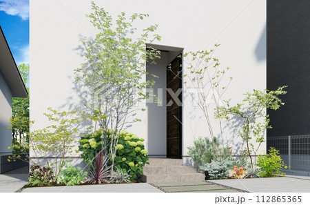 シンプルモダンな建物と雑木のあるエントランス 112865365