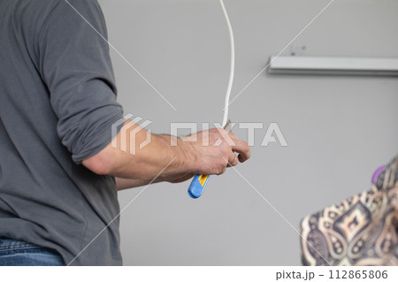 The profession of electrician is one of the most demanding and responsible professions of a construction worker. 112865806