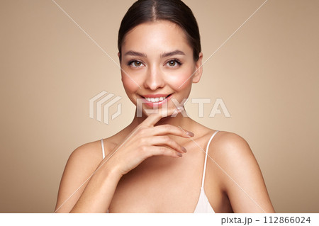 Portrait beautiful young woman with clean fresh skin Portrait beautiful young woman with clean fresh skin 112866024