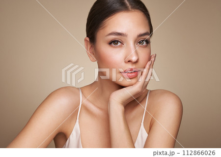 Portrait beautiful young woman with clean fresh skin Portrait beautiful young woman with clean fresh skin 112866026