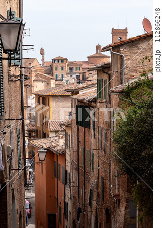 Somewhere in the streets of the old medieval Siena city Somewhere in the streets of the old medieval Siena city 112866248