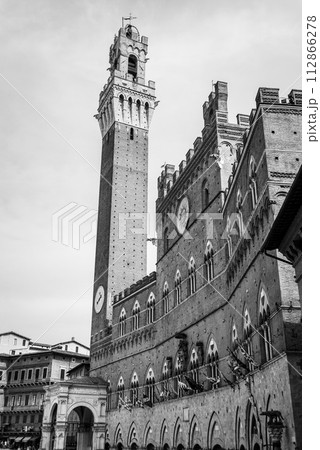 The iconic Palazzo Pubblico at the Piazza del Campo in downtown Siena The iconic Palazzo Pubblico at the Piazza del Campo in downtown Siena 112866278