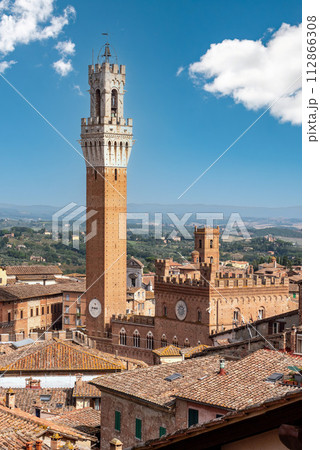 View over the roofs of Siena towards the Torre Magna, seen from the roof of the Siena cathedral View over the roofs of Siena towards the Torre Magna, seen from the roof of the Siena cathedral 112866308