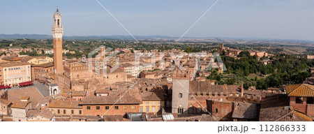 View over the roofs of Siena towards the Torre Magna, seen from the roof of the Siena cathedral 112866333