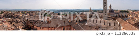 Panoramic view over downtown Siena and the cathedral, seen from the Facciatone panoramic viewpoint Panoramic view over downtown Siena and the cathedral, seen from the Facciatone panoramic viewpoint 112866338