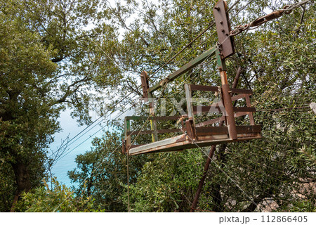 An old cargo cable car at the Amalfi coast, used for lemon farming, Italy An old cargo cable car at the Amalfi coast, used for lemon farming, Italy 112866405