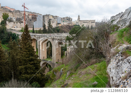 The famous aqueduct bridge from Roman times in Gravina, Italy The famous aqueduct bridge from Roman times in Gravina, Italy 112866510