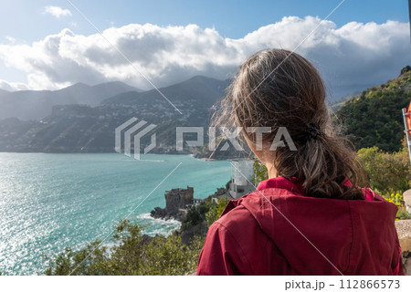 A female person enjoying the view on the Amalfi coast, Italy A female person enjoying the view on the Amalfi coast, Italy 112866573
