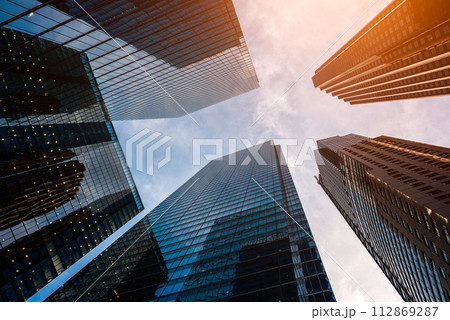 tall skyscrapers buildings looking up perspective, modern architecture of steel and glass, skyline of big city tall skyscrapers buildings looking up perspective, modern architecture of steel and glass, skyline of big city 112869287
