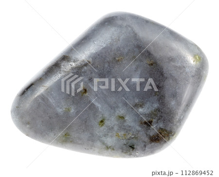 tumbled melilite mineral isolated on white tumbled melilite mineral isolated on white 112869452