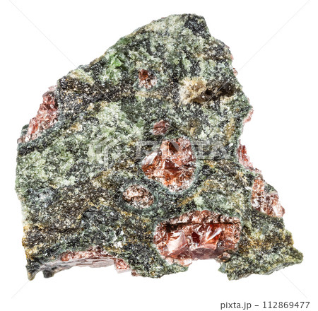 pyrope garnets in unpolished rock isolated 112869477