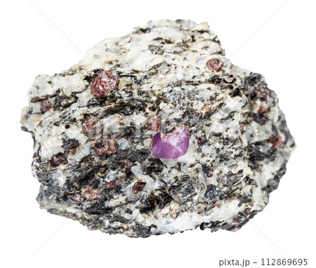 ruby crystals in unpolished rock isolated 112869695