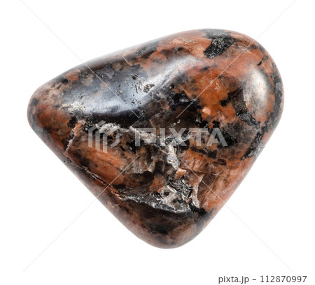 tumbled granosyenite mineral isolated on white 112870997
