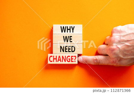 Why we need change symbol. Concept words Why we need change on beautiful wooden block. Beautiful orange table orange background. Voter hand. Business and why we need change concept. Copy space. 112871366