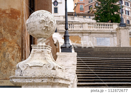 The famous Spanish Steps at Piazza di Spagna and Trinita dei Monti church at the top in Rome, Italy. The famous Spanish Steps at Piazza di Spagna and Trinita dei Monti church at the top in Rome, Italy. 112872677