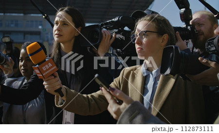 Organization representative answering press questions Organization representative answering press questions 112873111