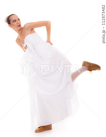 Wedding. Running bride funny woman in sport shoes Wedding. Running bride funny woman in sport shoes 112873482