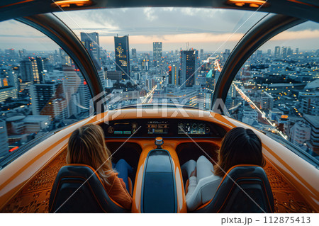 AI-generated content. Two women sitting inside modern flying car, navigating through the urban skyline, enjoying the panoramic view from the cabin 112875413