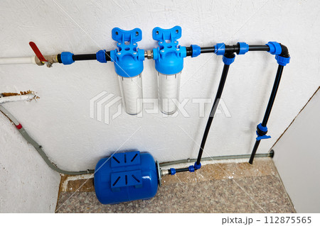 Utility room which water bladder tank and purification filters for cold drinking water of domestic water supply system. 112875565