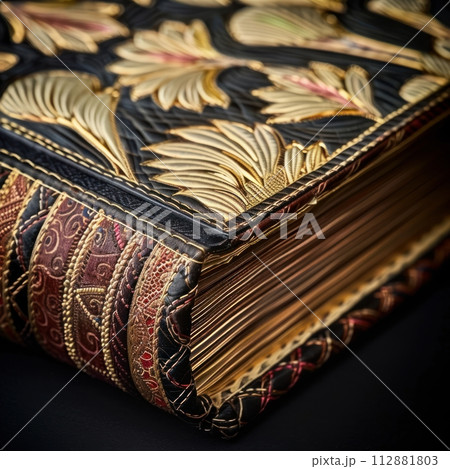 Emphasize the intricate patterns and textures of different bookbinding techniques from a unique highangle perspective Showcase the precision and attention to detail in every stitch, fold, and trim, 112881803