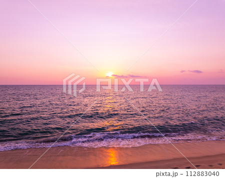 Landscape Sunset sky,Nature beautiful Light Sunset or sunrise over sea,Colorful dramatic majestic scenery sunset Sky with Amazing clouds and waves in sunset sky,Nature light cloud background 112883040