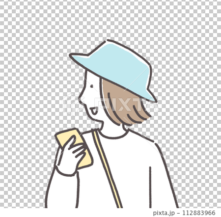 A woman checking her cell phone while going out 112883966
