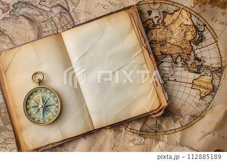 Vintage compass and old map on old paper background, travel concept Vintage compass and old map on old paper background, travel concept 112885189