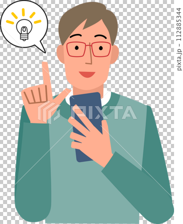 Upper body of a man pointing with a smile while looking at his smartphone 112885344