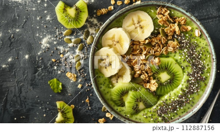 AI-generated content. Healthy green smoothie bowl with kiwi and banana toppings 112887156