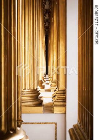 Golden Columns in the Palace Vertical Photo. High quality photo 112889039