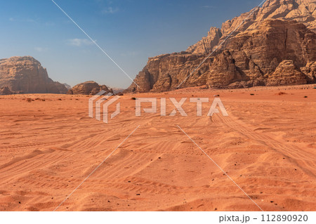 Wadi Rum desert with tire tracks in Jordan Wadi Rum desert with tire tracks in Jordan 112890920