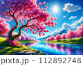 池に反射する太陽と美しい桜の木 112892748