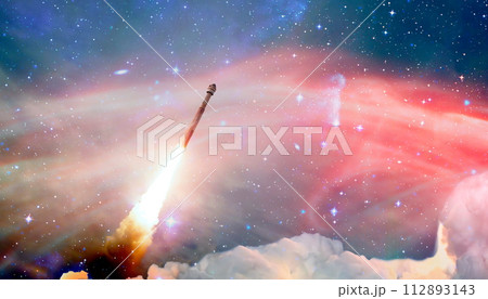 rockets launch into space on the starry sky. spacecraft flies into space with clouds of smoke. Elements of this image furnished by NASA 112893143