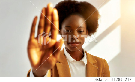 Woman with her Hand Outstretched as a Sign of Stop Against Violence - Generative Ai 112893218