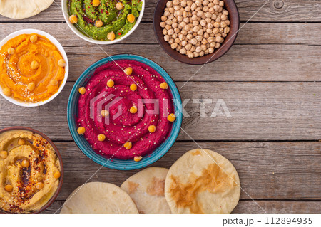 Declicious food from chickpea - mix of hummus Declicious food from chickpea - mix of hummus 112894935