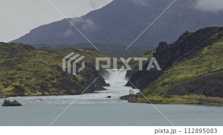 Torres del Paine Glacier Waterfall Over Colorful Lake 112895083