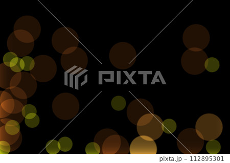 Defocused orange, yellow bokeh, round lamps of varying degrees of blur and transparency on a dark night background. Blank for artwork 112895301