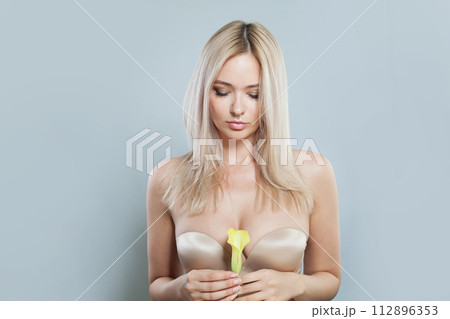 Sensual blonde model woman portrait. Facial treatment, cosmetology, skin care concept 112896353