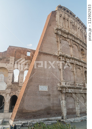 Part of stone walls of the Colosseum. Part of stone walls of the Colosseum. 112902933