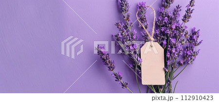 Lavender flowers on a purple background 112910423