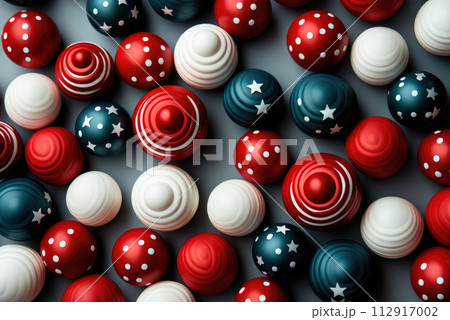Concept of celebrating America's Independence Day. Top view flat pattern image in the colors of the national flag of blue, red, white balls with stars on a blue background 112917002