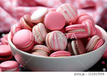 White and pink French macaroons in a bowl White and pink French macaroons in a bowl 112917056