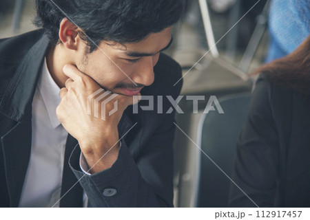 Asian Man thinking wear eyeglasses using laptop at home office. Desperate man stress headache depressed from startup small business at home office. Failure businesman working holding smart tablet 112917457