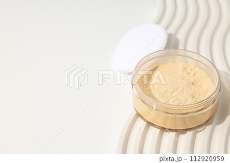Face powder, light shade on a light background. Face powder, light shade on a light background. 112920959