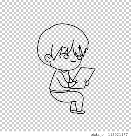 A boy is sitting on a chair and reading a book A boy is sitting on a chair and reading a book 112921177